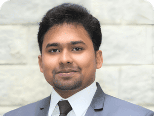 Ravi Teja Mandapati portrait in a suit and tie